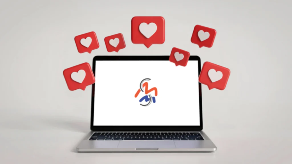 Laptop with MMS logo on it with social media hearts around it.