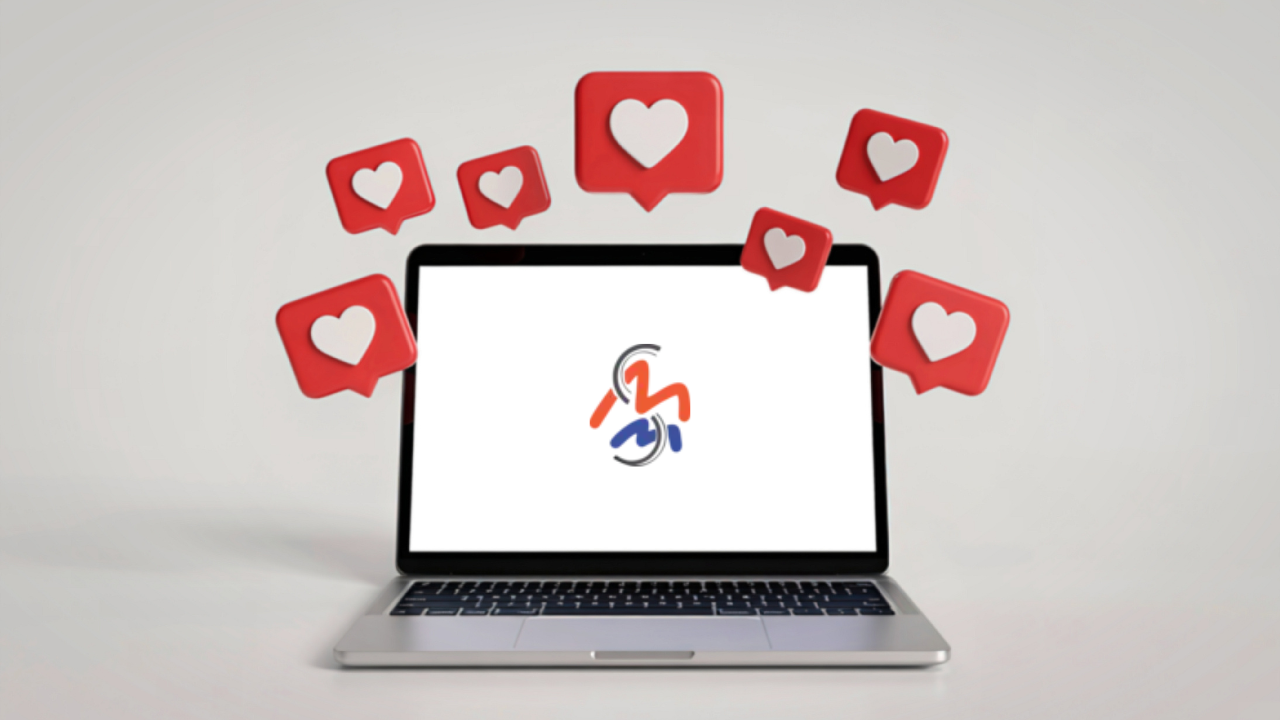 Laptop with MMS logo on it with social media hearts around it.