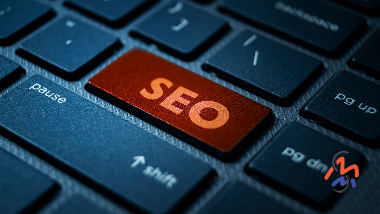 Red SEO button on keyboard with Madison Media Services logo in bottom right.